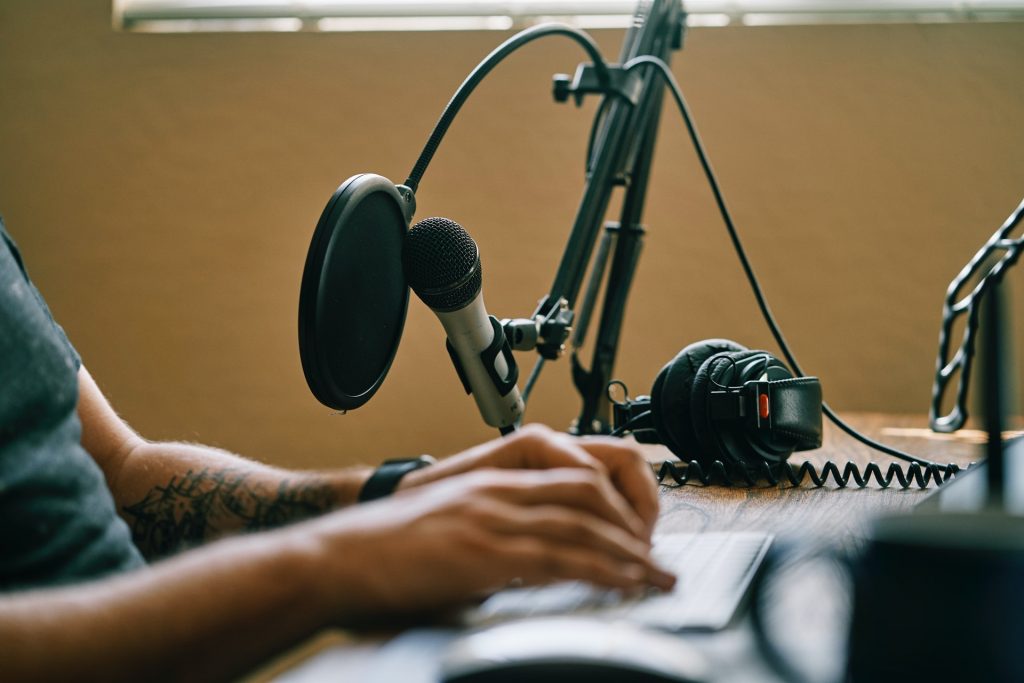 Content creator writing script with a podcast script template