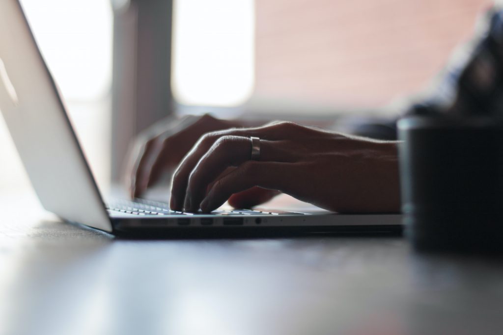 Person transcribing minutes of meetings